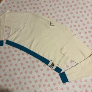 Free people we the free into the blue sweater size xsmall 
New with tag